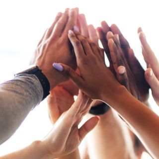 A group of hands holding